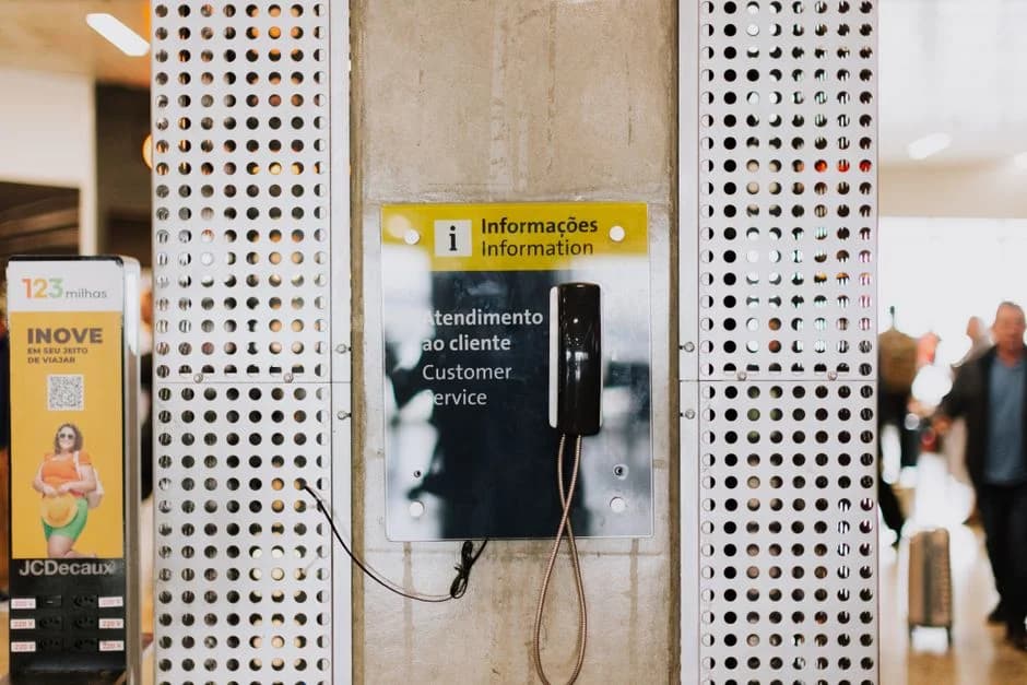Neatly arranged network cables plugged into a wall-mounted patch panel