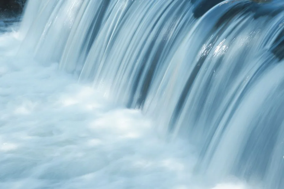 A gentle waterfall cascades in Oberwart, Austria, mirroring the flow of data between waterfall enrichment and API integr